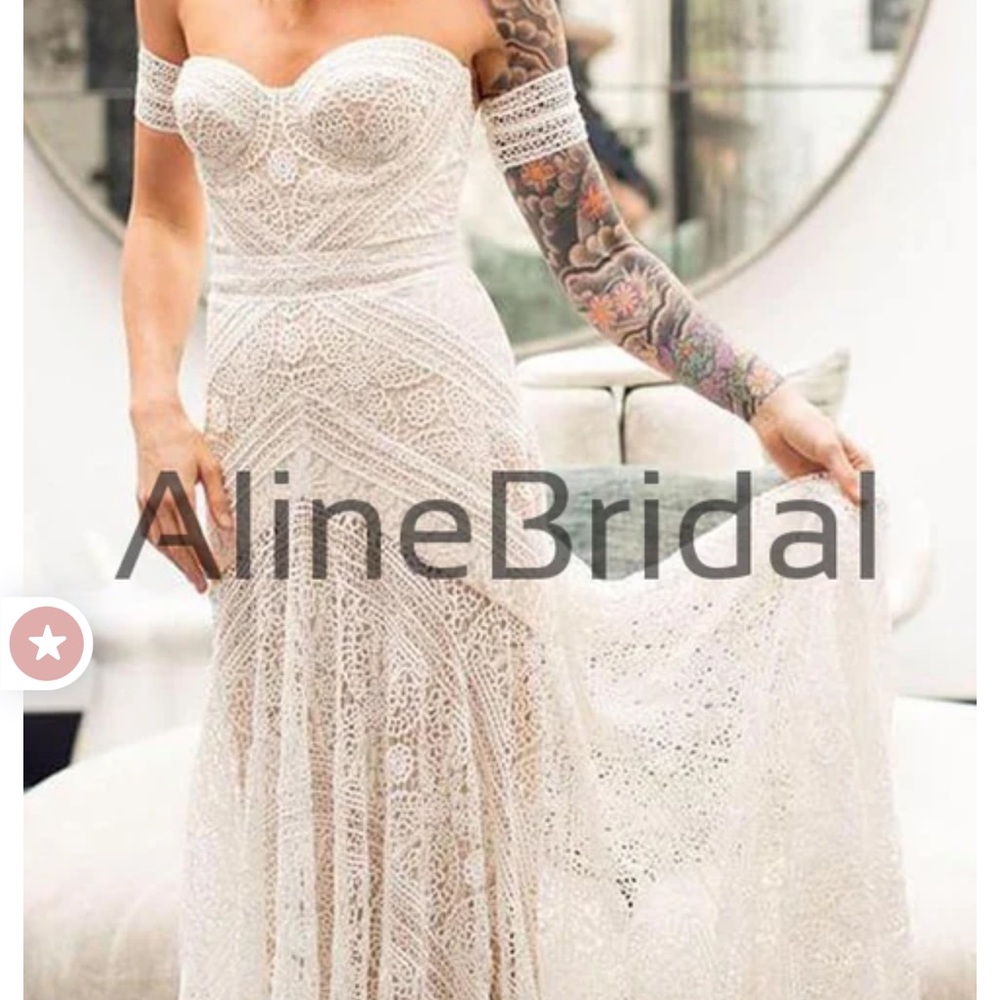 Beautiful wedding dress new with tags. Only tried on.